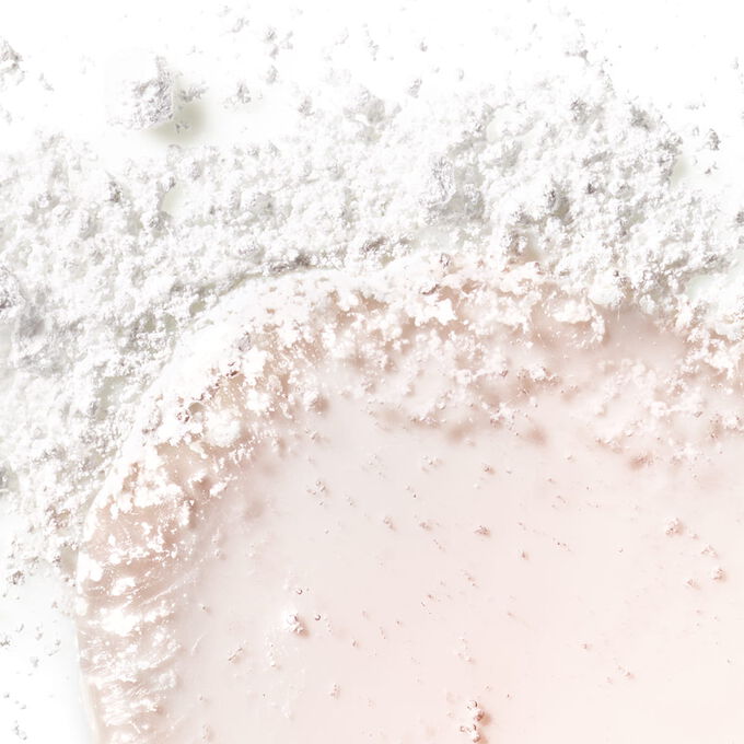 PURE-RESET targeted blemish lotion on texture that dries up blemishes in one night.