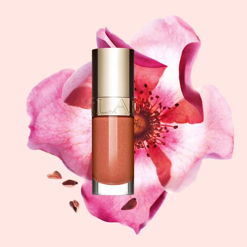 Clarins Lip Comfort Oil - Limited Edition in Peachy shimmery shade, hydrating and plumping for all-day nourishment