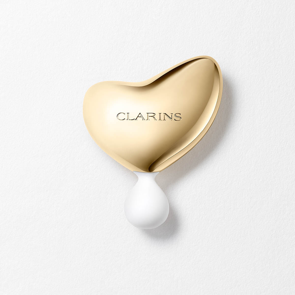 Precious L'Outil 3-in-1 Facial Massage Tool | CLARINS®