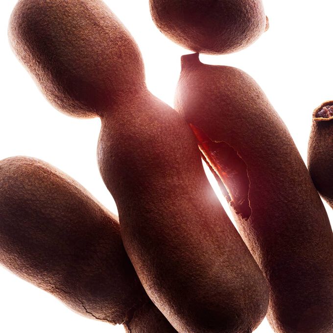 PURE-RESET purifying lotion with tamarind pulp acids to help refine skin texture.