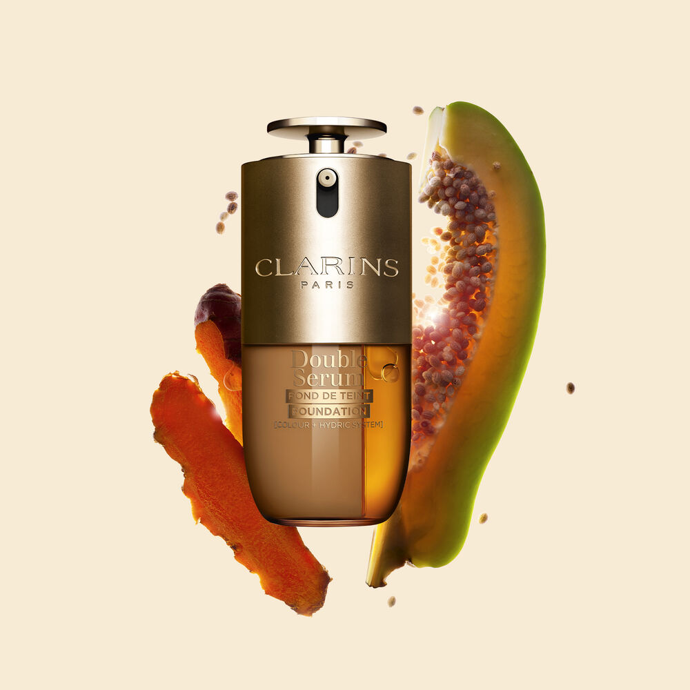 Packshot of Clarins Double Serum Foundation available for every skin tone, featuring key ingredients turmeric and papainPackshot of Clarins Double Serum Foundation available for every skin tone, featuring key ingredients turmeric and papain