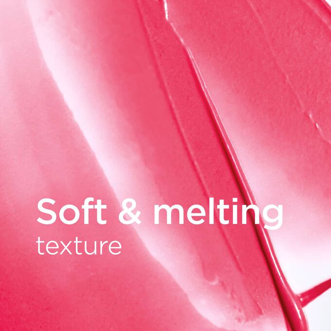 Textured creamy pink background with text highlighting the soft, melting texture of the Lip Balm Love Collection for smooth lips